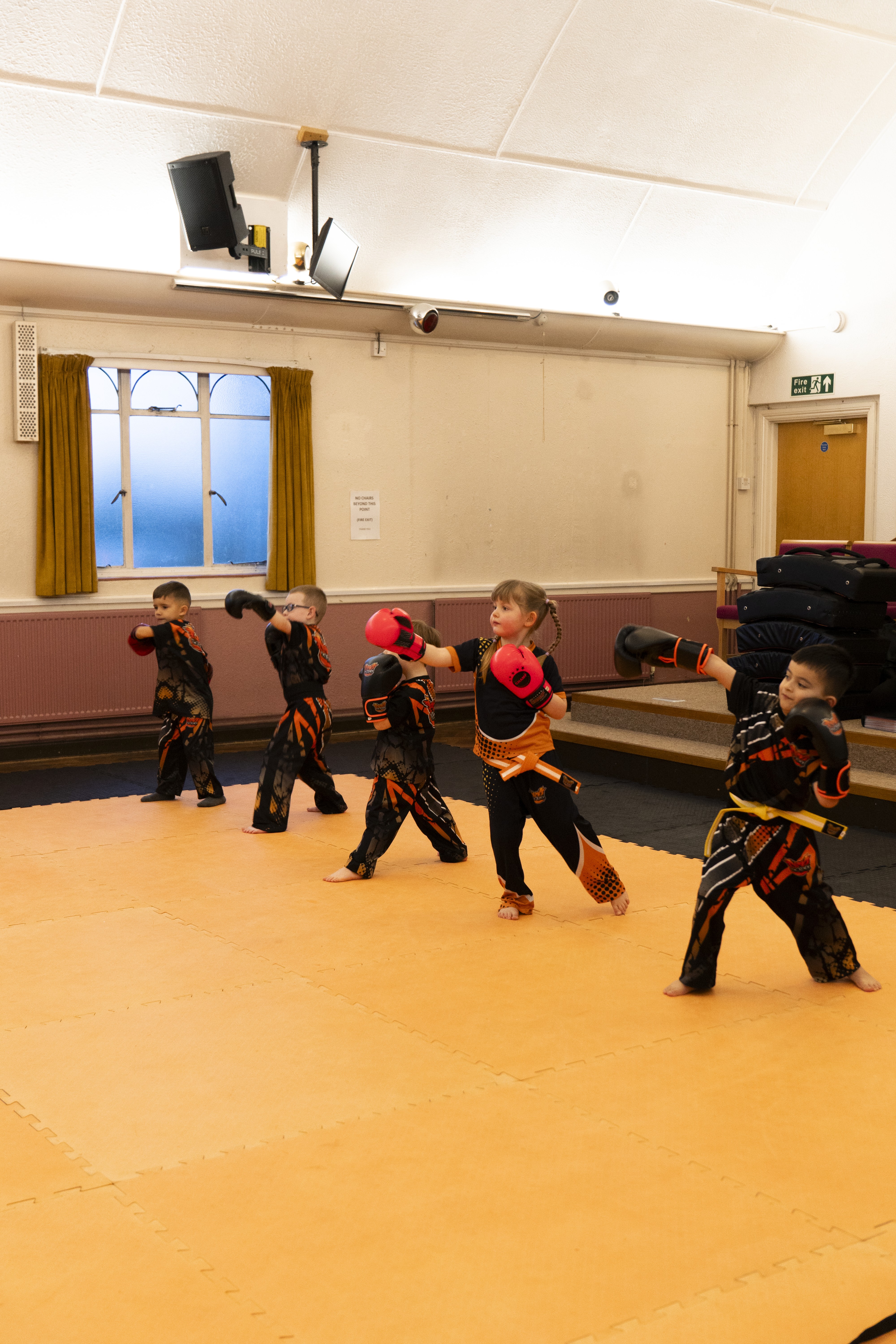 Young children practising punches in Kids Kickboxing class
