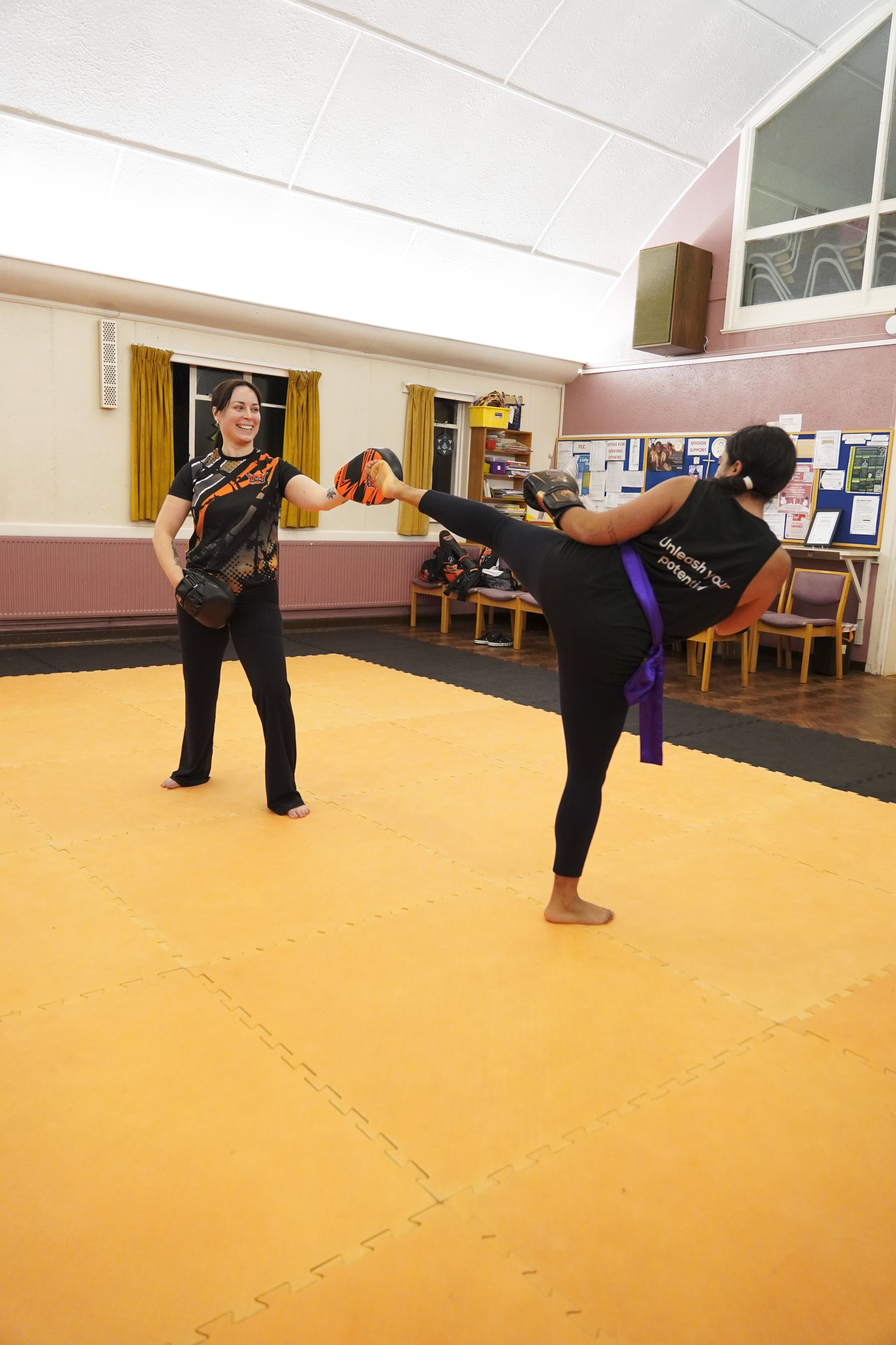 New adult student arriving and meeting coach